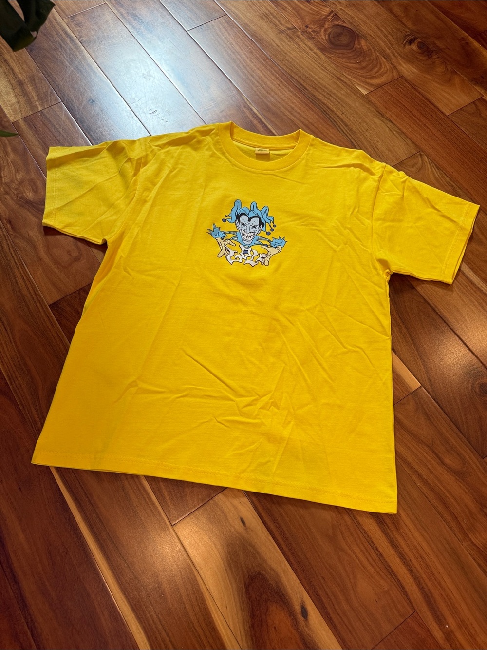 Golf Wang Jester Yellow Short Sleeve Tee with Blue Jester Graphic